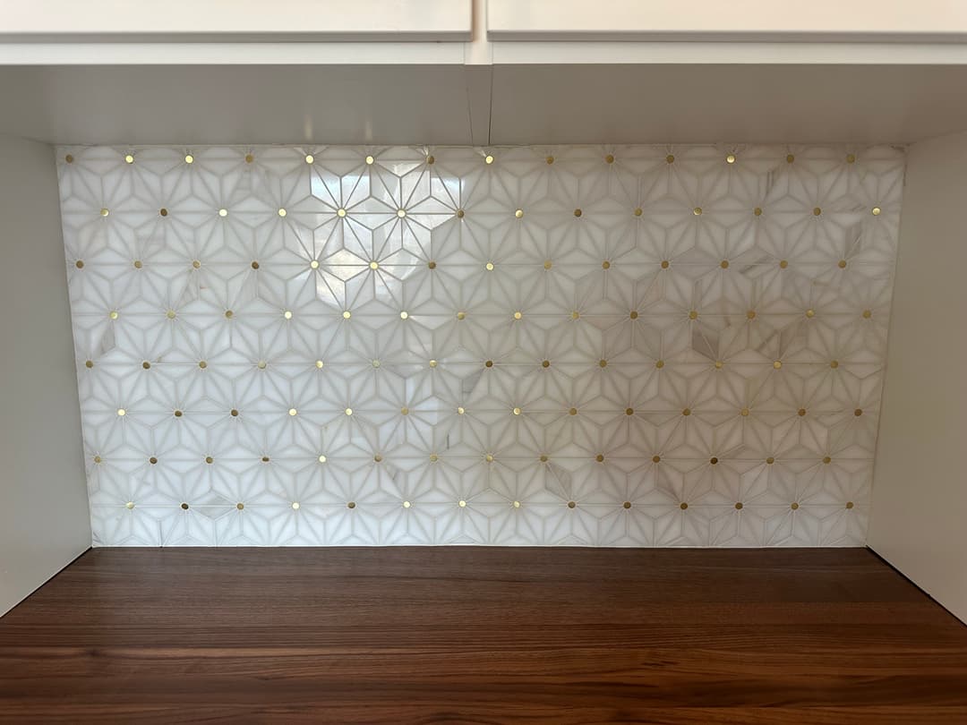 custom pearl luxury tile backsplash in a kitchen